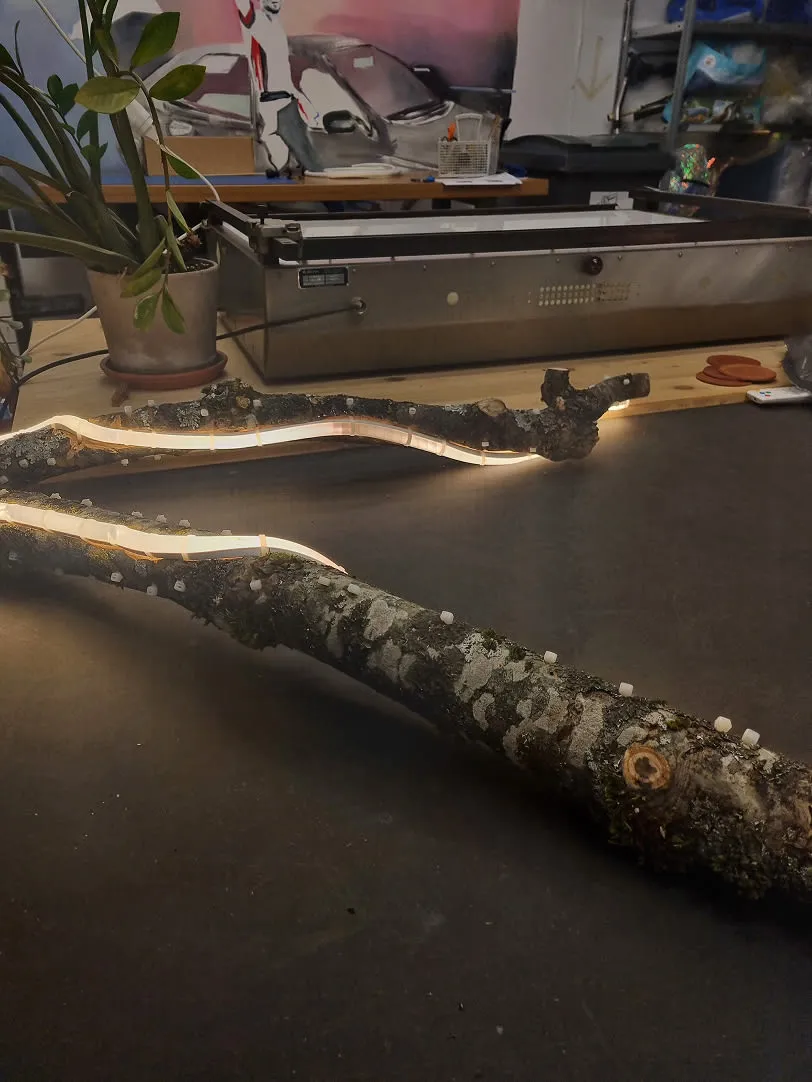 A long piece of wood sitting on top of a table