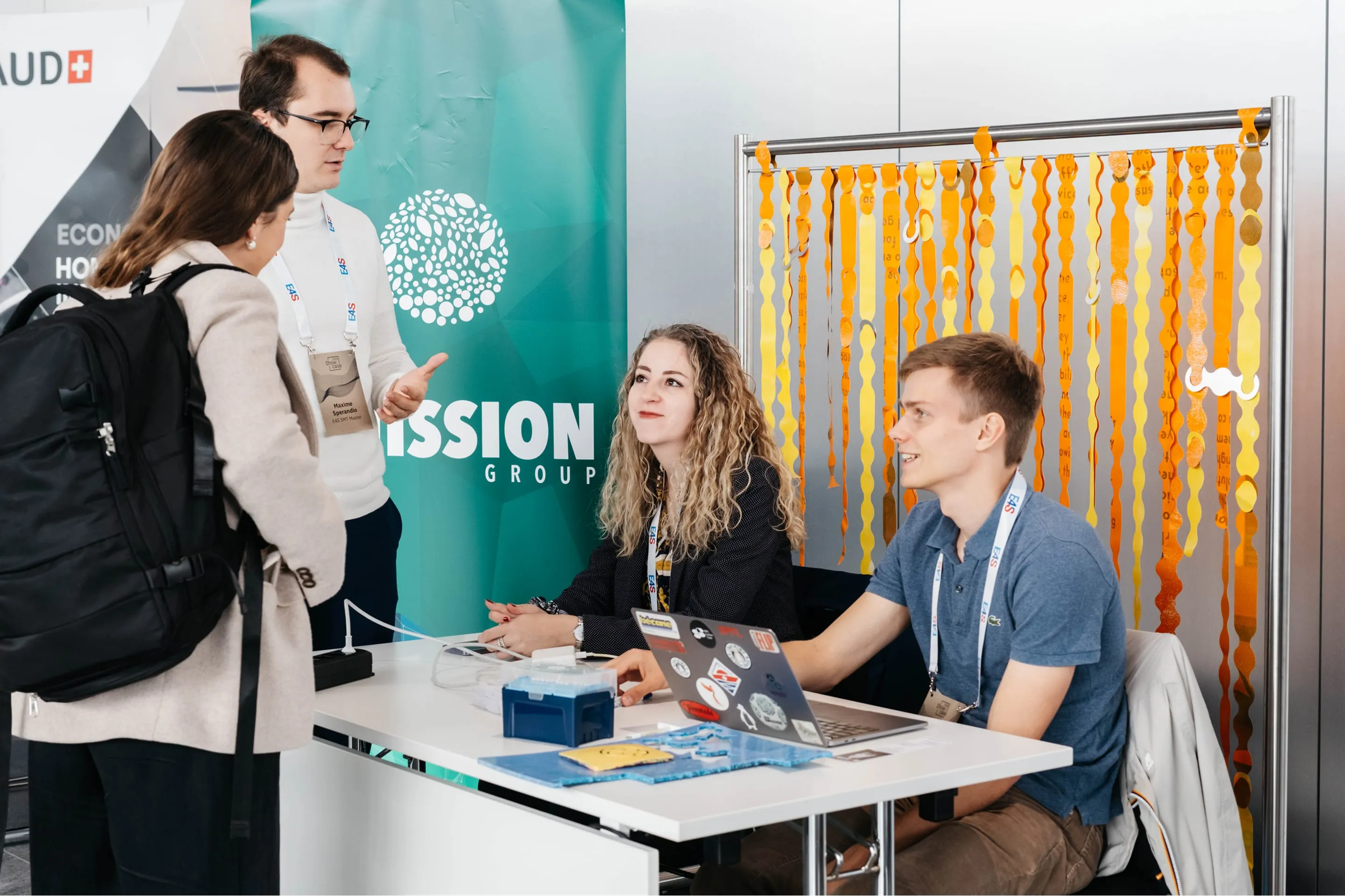 A group of people sitting around a table