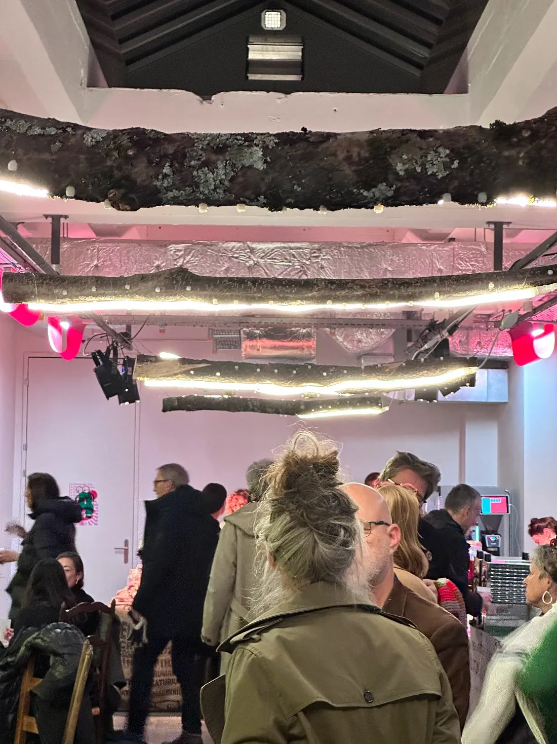 A group of people standing in a room