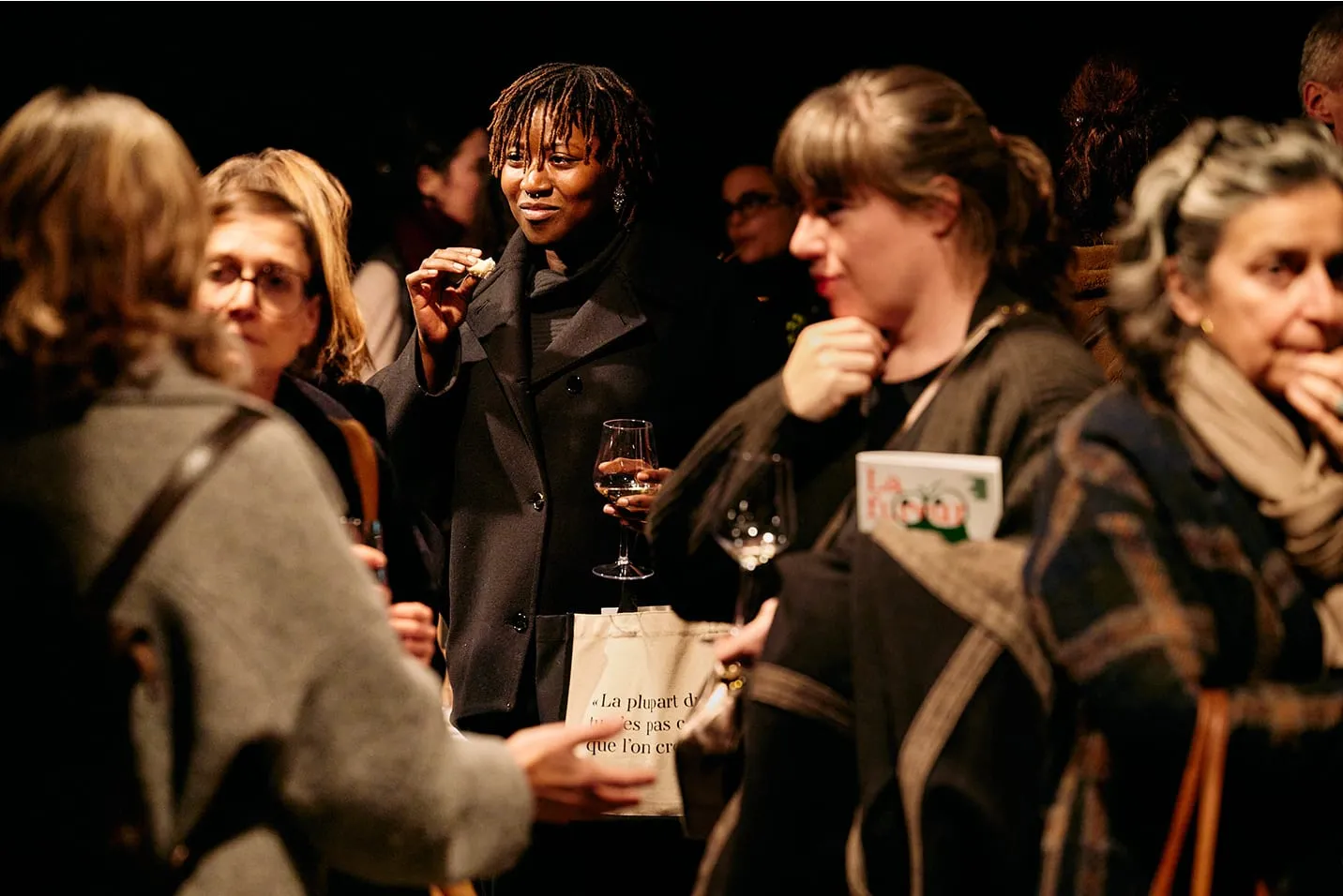 A group of people standing next to each other