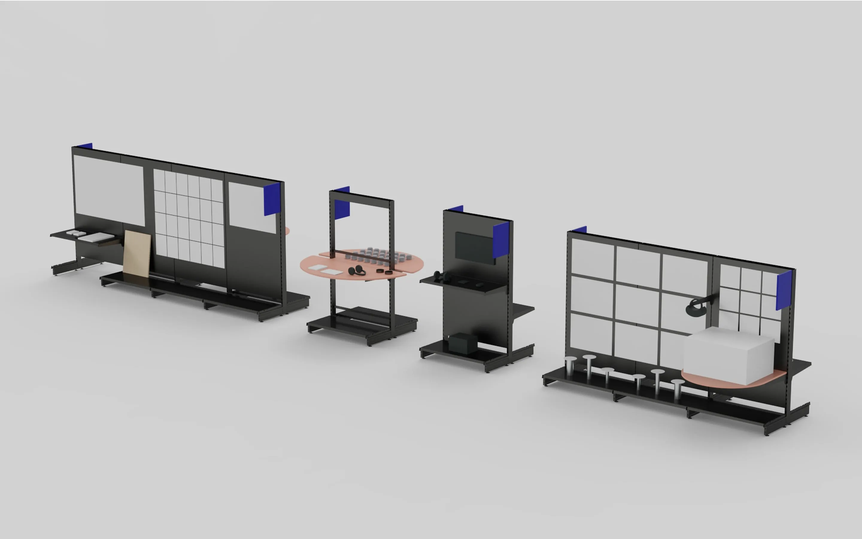 Un ensemble de trois tables et un lit dans une pièce