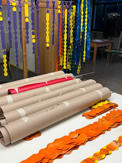 A table with a roll of brown paper on top of it